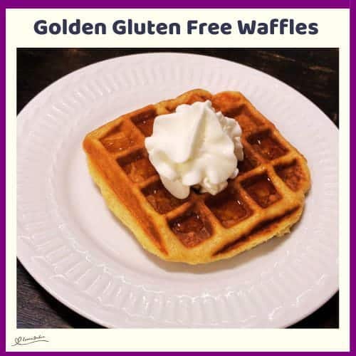 An image of Golden Gluten Free Waffles in the making and served with a splash of maple suryp and a dollop of cream