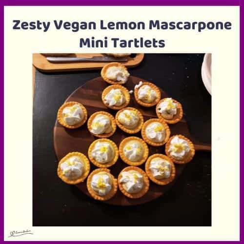 An image of Vegan Lemon Mascarpone Mini Tartlets with grated lemon rind