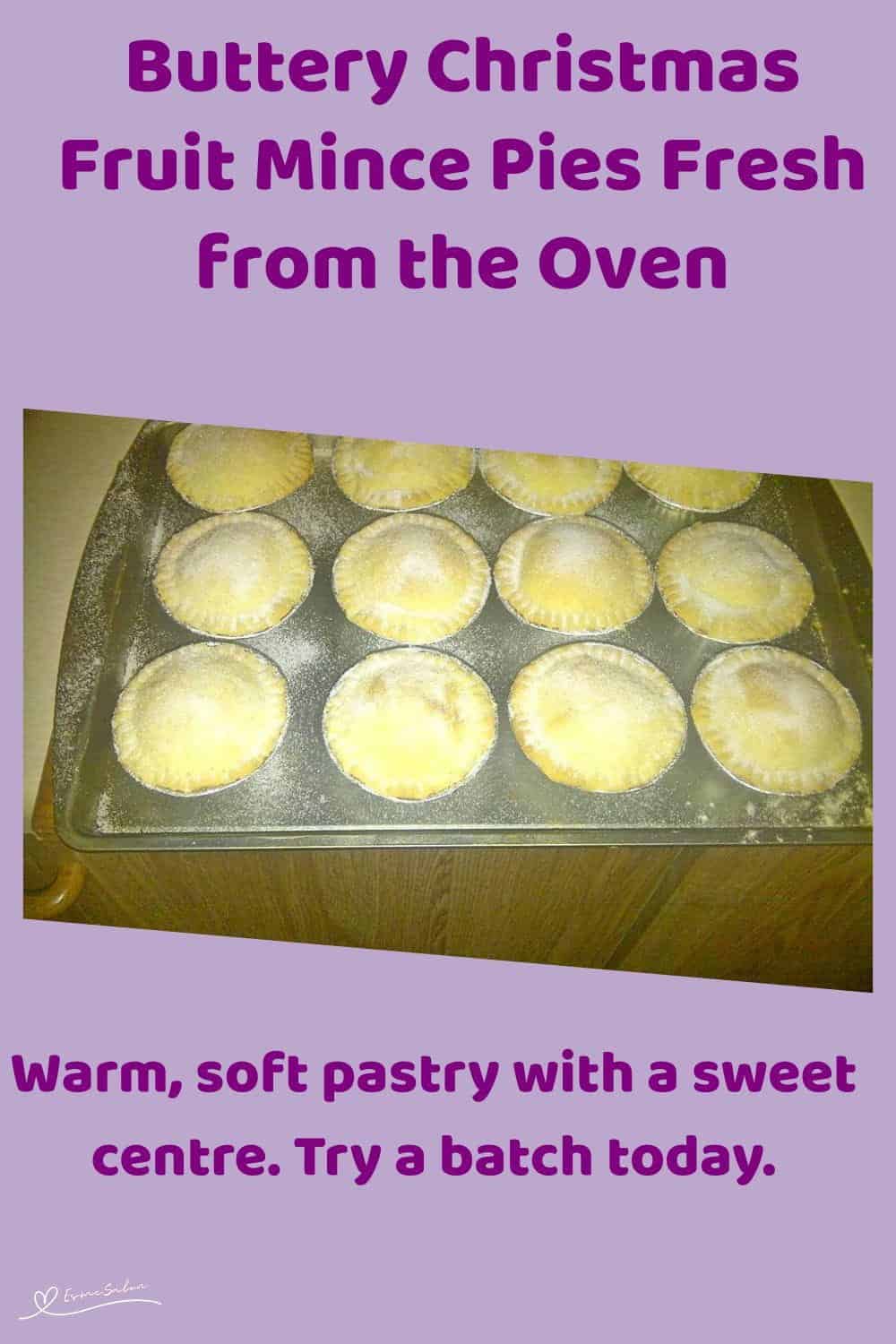 An image of a baking tray and wooden platter with Buttery Christmas Fruit Mince Pies