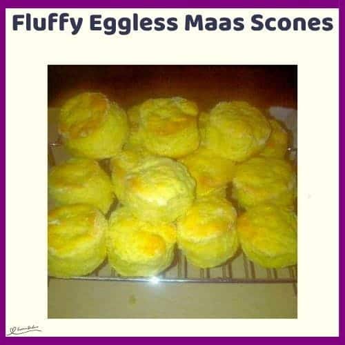 An image of Fluffy Eggless Maas Scones on a cooling wire rack after baking