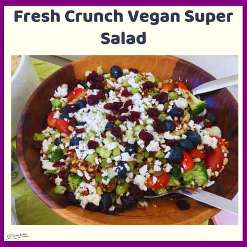 An image of a Fresh Crunch Vegan Super Salad in a wooden oblong bowl