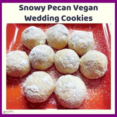 An image of a red platter with Snowy Pecan Vegan Wedding Cookies