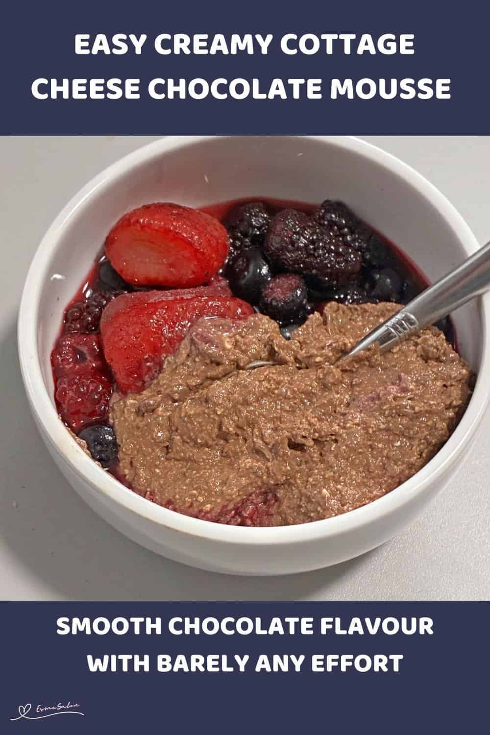An image of a white bowl with Creamy Cottage Cheese Chocolate Mousse and a variety of berries