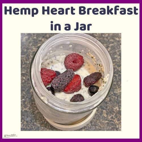 An image of a Hemp Heart Breakfast in a Jar topped with berries