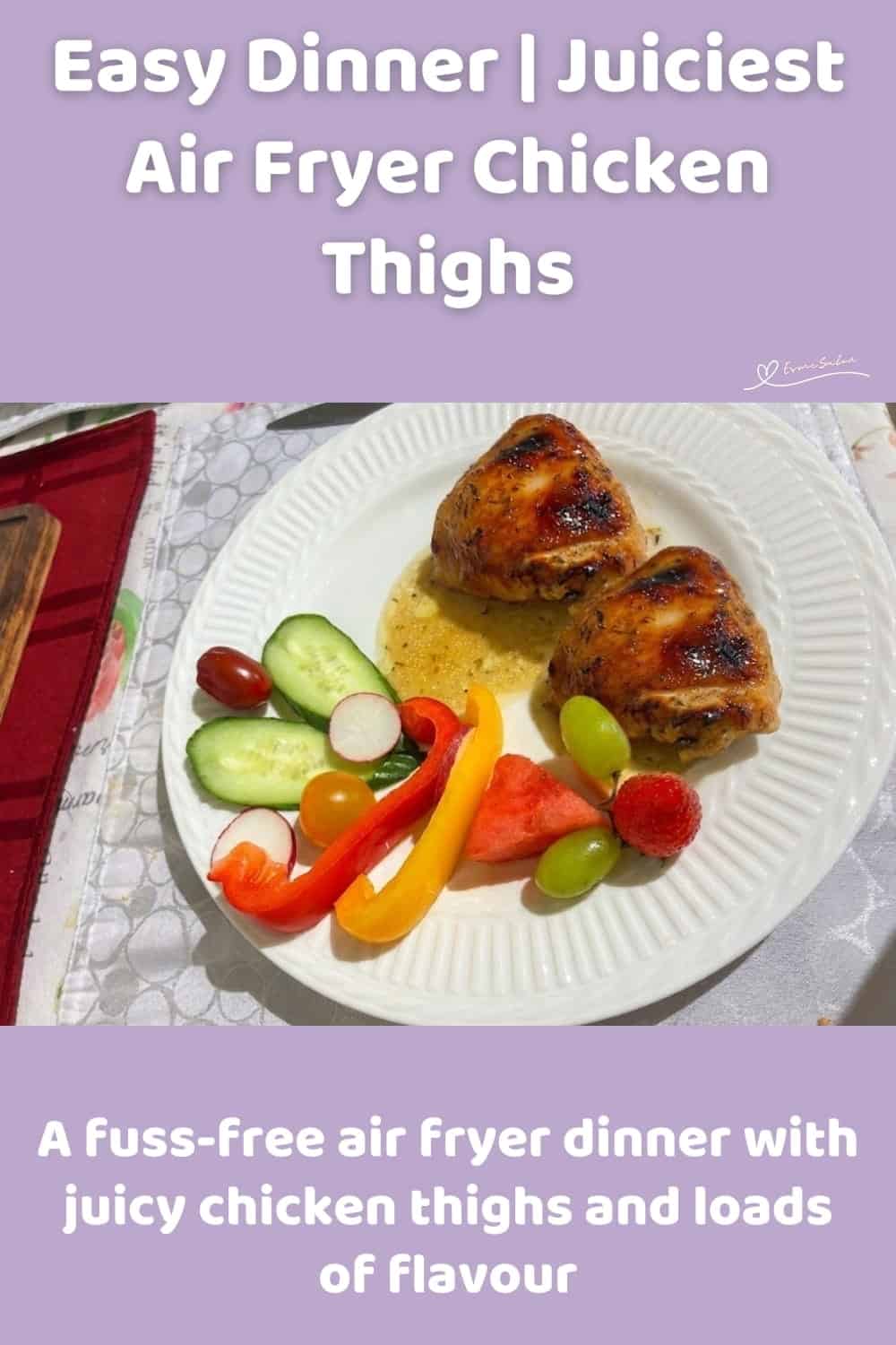An image of a plate of Juiciest Air Fryer Chicken Thighs with a side of salad