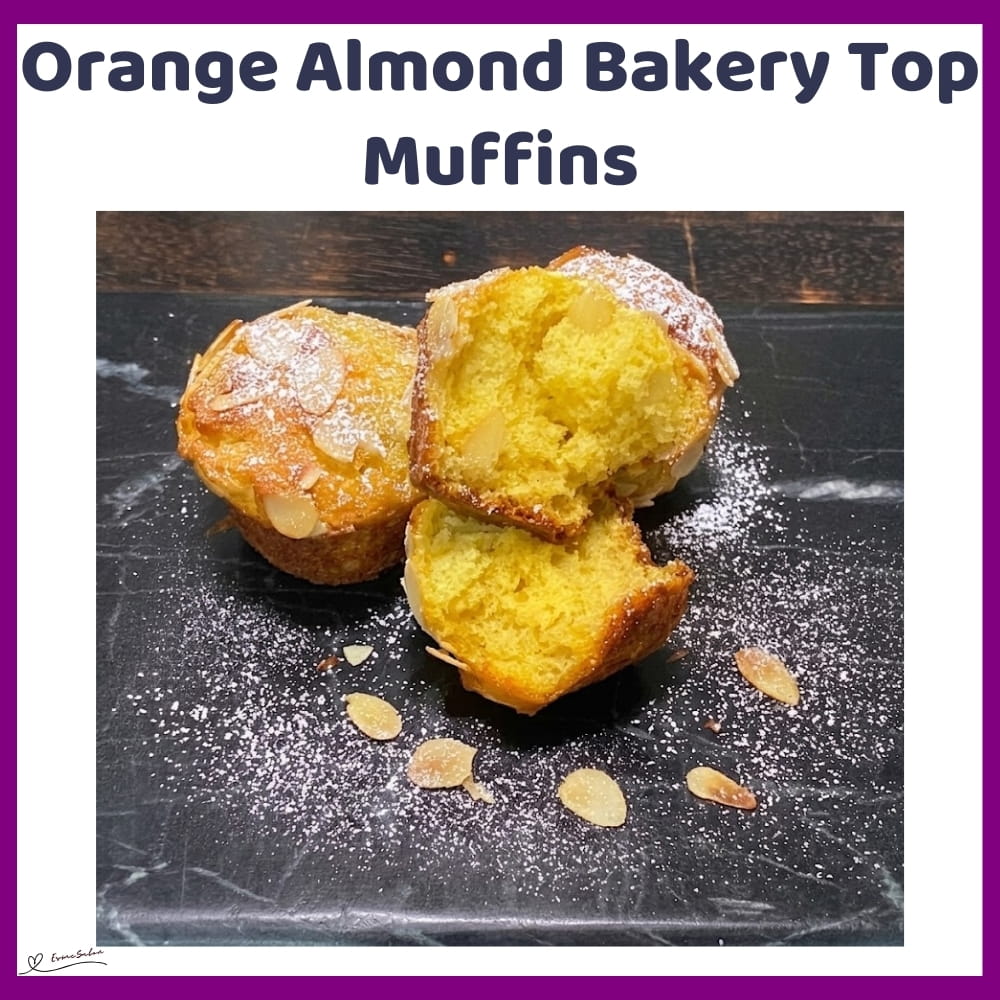 An image of Orange Muffins with Fresh Orange and slivered Almonds